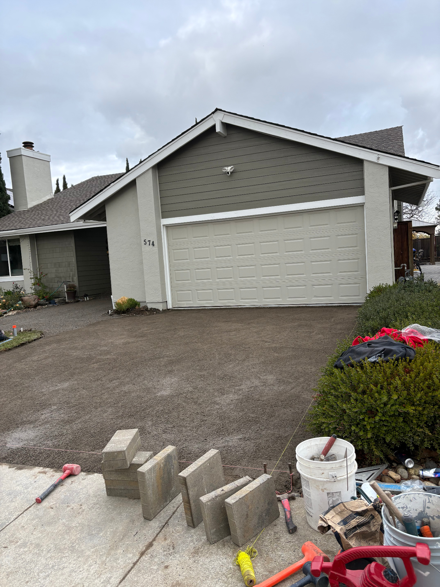 Driveway & Entry Stairs Install — Before