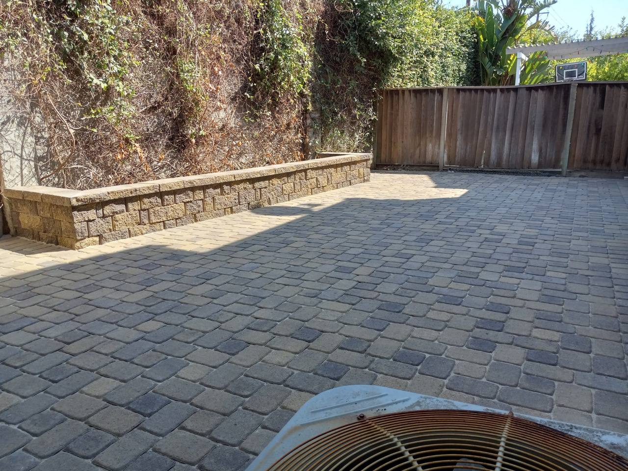 Backyard Patio & Retaining Wall Pavers — Completed