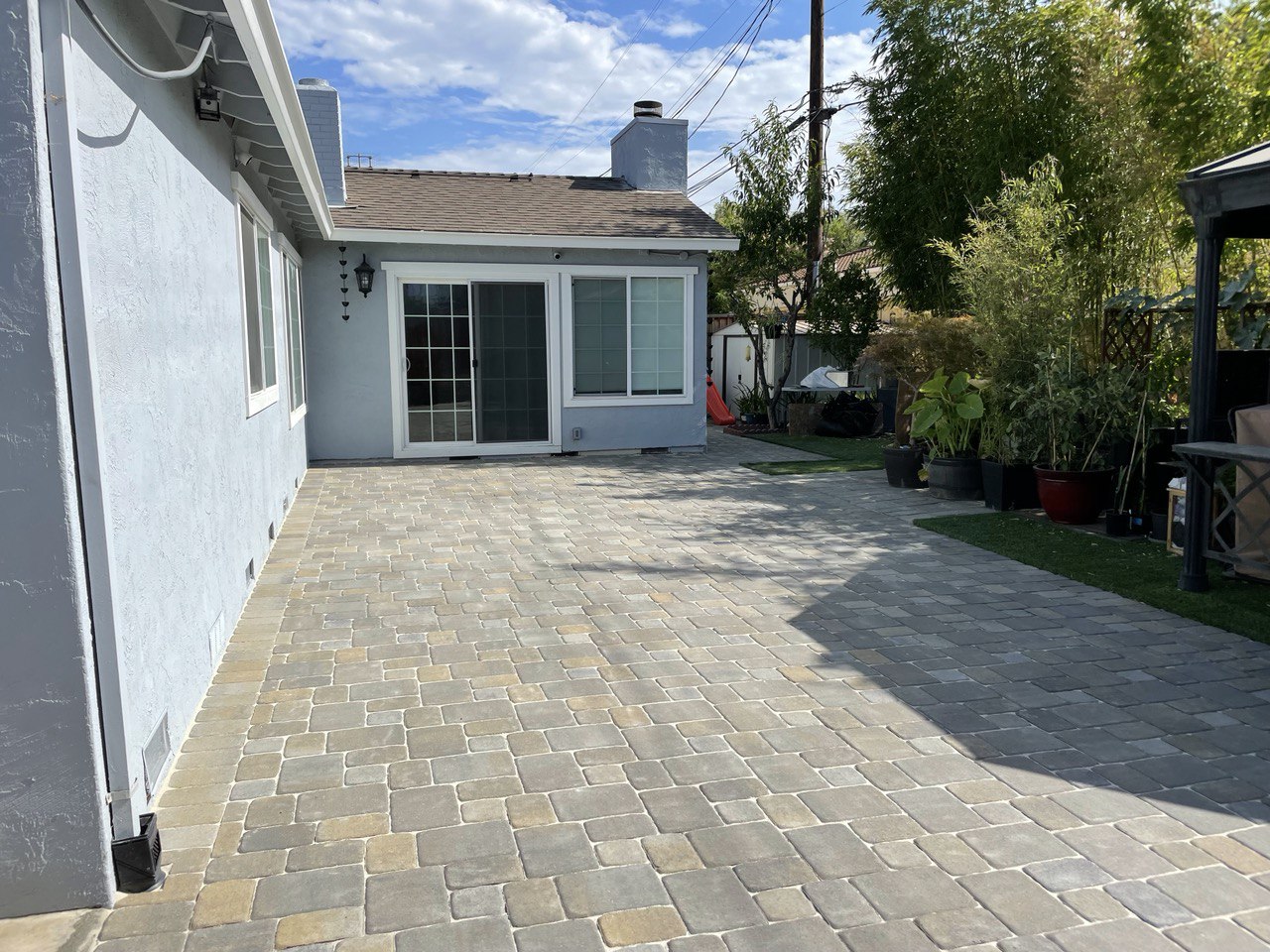 Backyard Patio & Retaining Wall Pavers — Completed